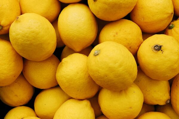 A pile of lemons, offering wellness tips and senior health benefits.