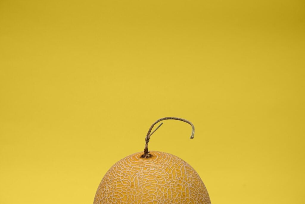 a grapefruit sitting on top of a table