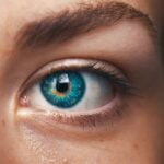 A close up of a woman's eye with blue eyes, showcasing senior health and wellness tips for anti-aging.